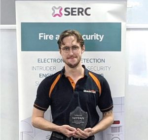 Adam Smylie, with his SERC Fire Engineering Apprentice of the Year award